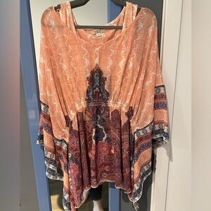 Womens size 2x two-piece top. Built in tank top underneath.